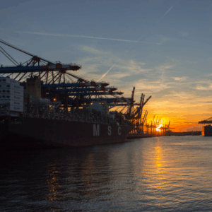 It includes pickup at origin, ground transportation, export, international freight (air or ocean), customs clearance, and final delivery to the consignee.
