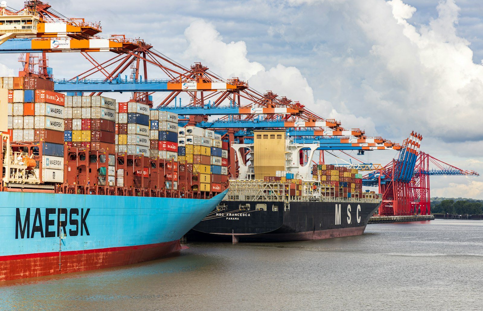 Large container ship and gantry cranes at the Northwest Seaport Alliance in Seattle