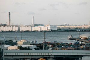 Cargo containers along the industrial waterfront of the Port of Yokohama in Japan