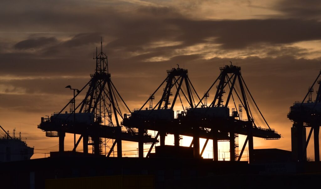 Container ship at the Port of Felixstowe in the UK at sunset