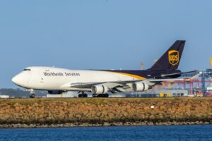 Large UPS cargo plane on the runway for air shipping from the USA to Australia