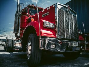 Freight semi-truck on the highway hauling cross-border cargo between the USA and Mexico