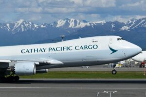 Cathay Pacific cargo freighter taking off with air freight from the USA to South Korea