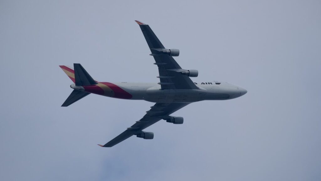 Cargo freighter aircraft carrying air freight from the USA to Switzerland