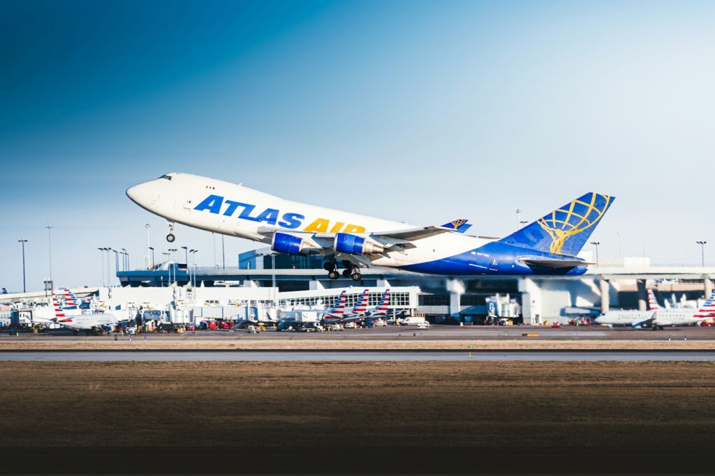 Atlas Air cargo freighter taking off with air freight bound from the USA to the UK
