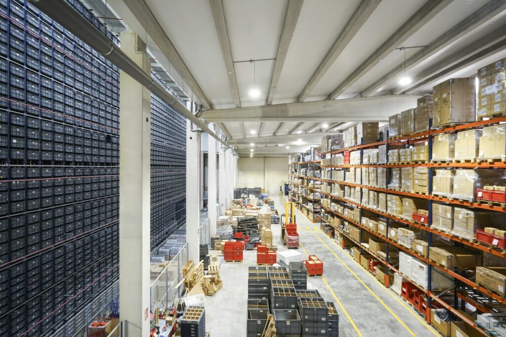 Contract logistics warehouse with pallet racking, automated tote storage towers and staged pallets