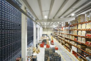 Contract logistics warehouse with pallet racking, automated tote storage towers and staged pallets