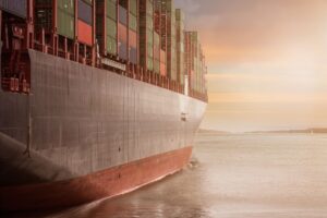 Container ship sailing on open sea