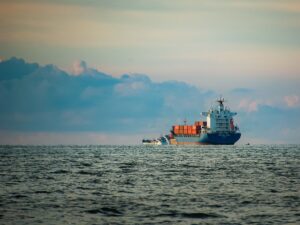 Container ship sailing across open water